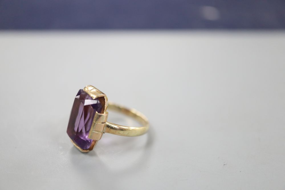 A 9ct gold and amethyst set dress ring, size K, gross 4.2 grams.